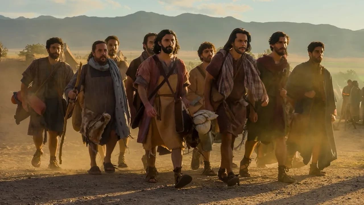 Jesus and the disciples walking together along a dusty road at golden hour, dust rising behind them